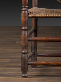 A William and Mary Style Parcel Gilt and Red Painted, Fan-Carved Bannister Back Woven Splint Seat Armchair