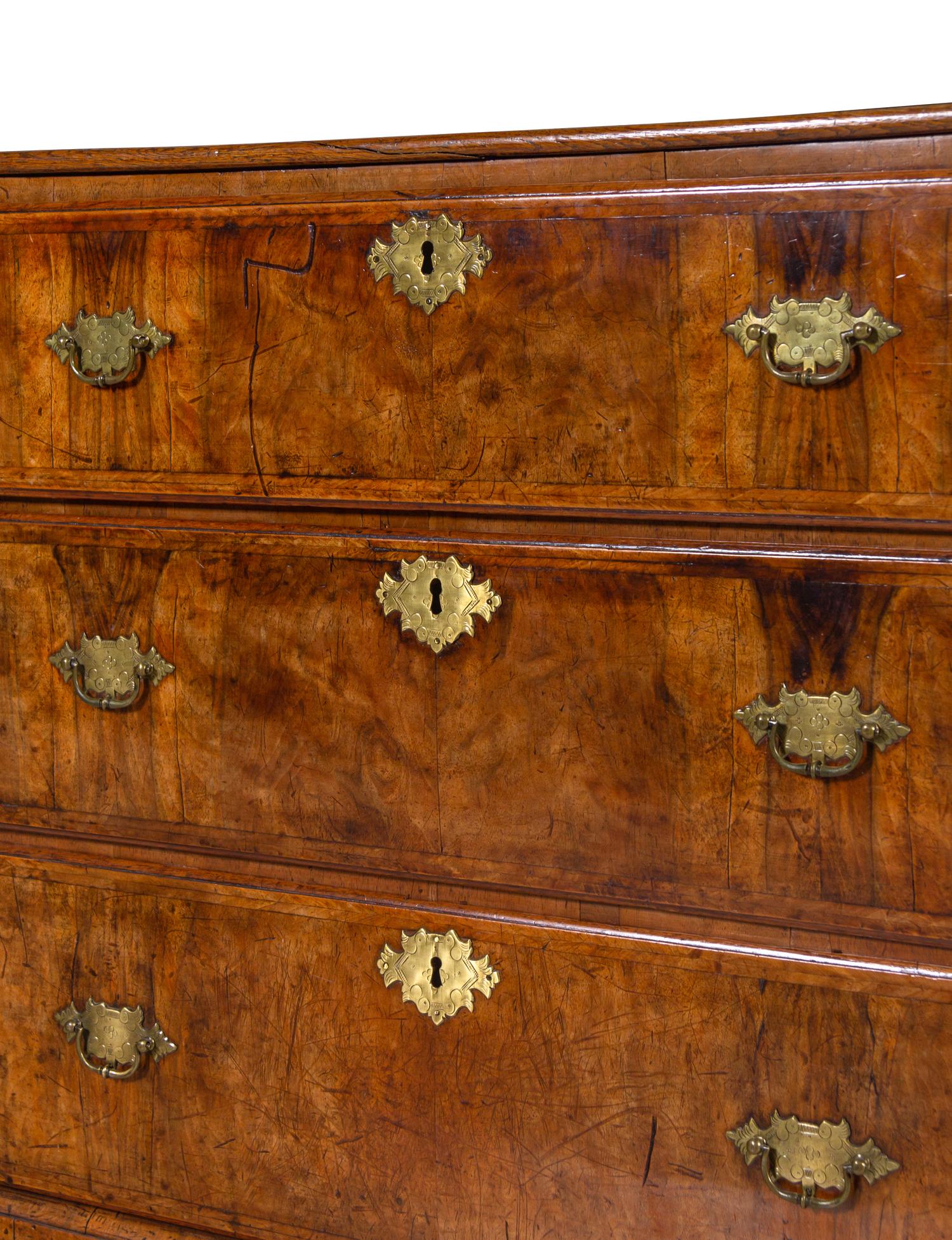 A George III Walnut and Oak Chest of Drawers