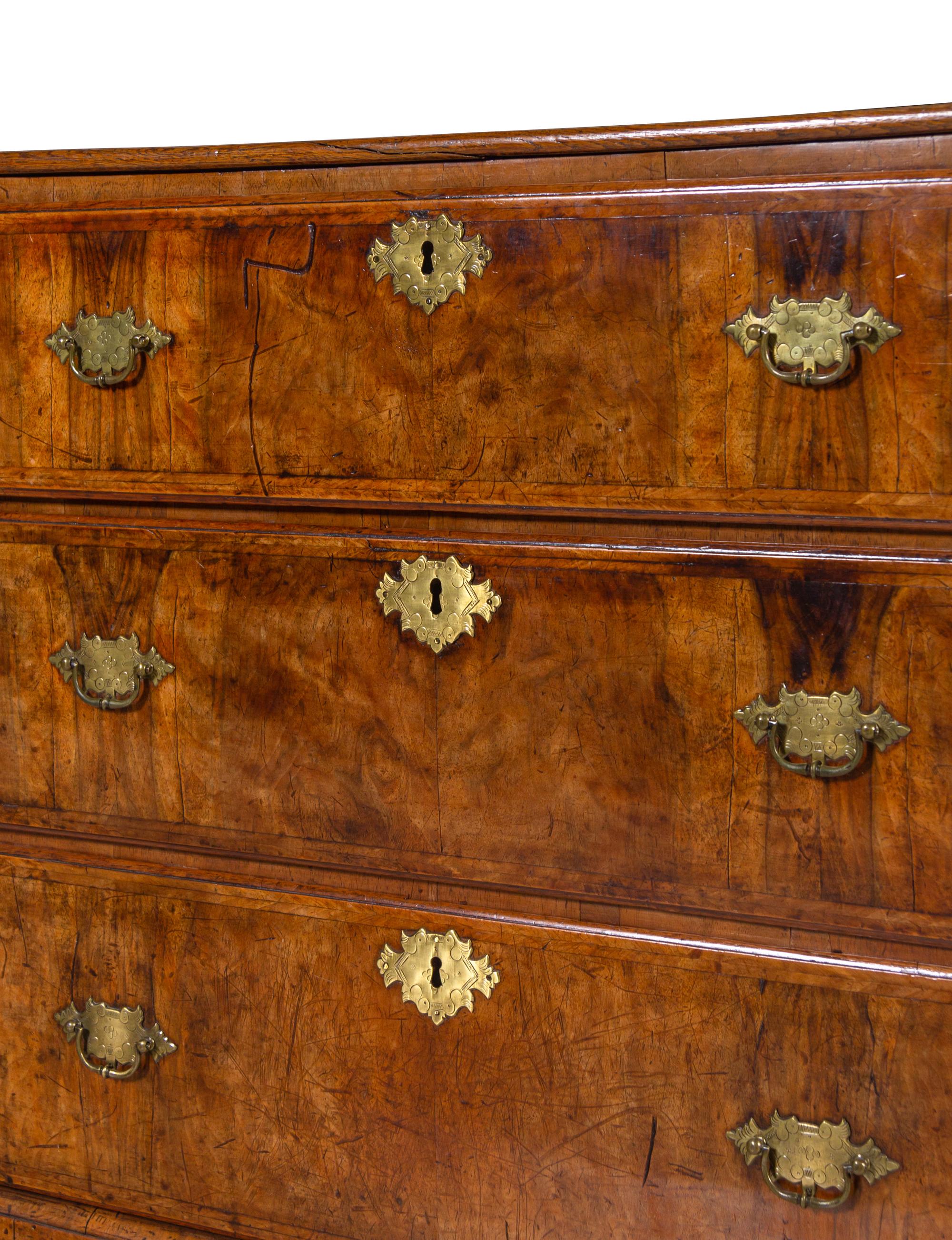 A George III Walnut and Oak Chest of Drawers