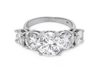 A 14 Karat White Gold and Diamond Ring,