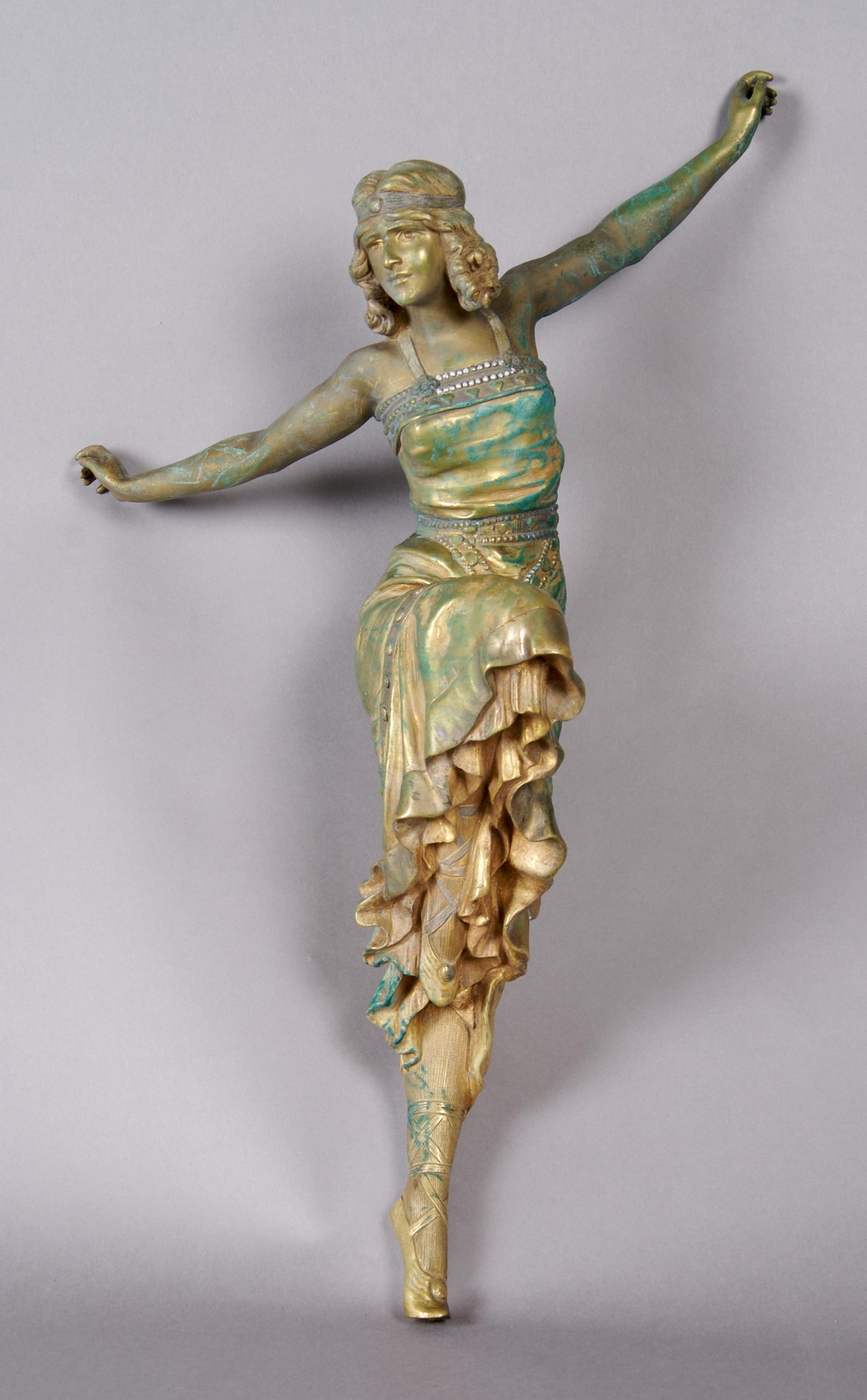 An Art Deco Gilt Bronze Figure, Height 15 3/4 inches.