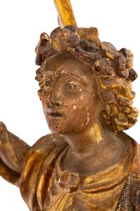 A Pair of Italian Painted and Parcel Gilt Figural Altar Prickets