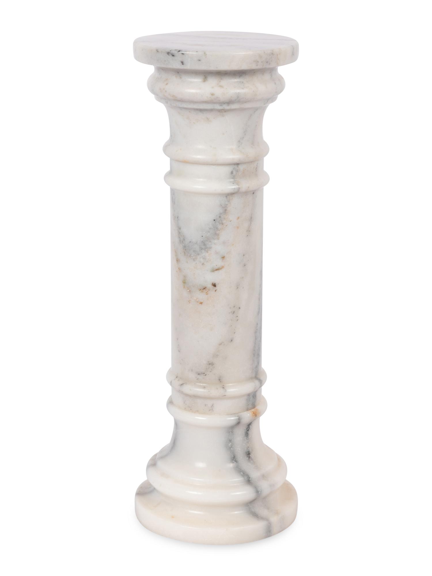 A Pair of Continental Carved Marble Pedestals