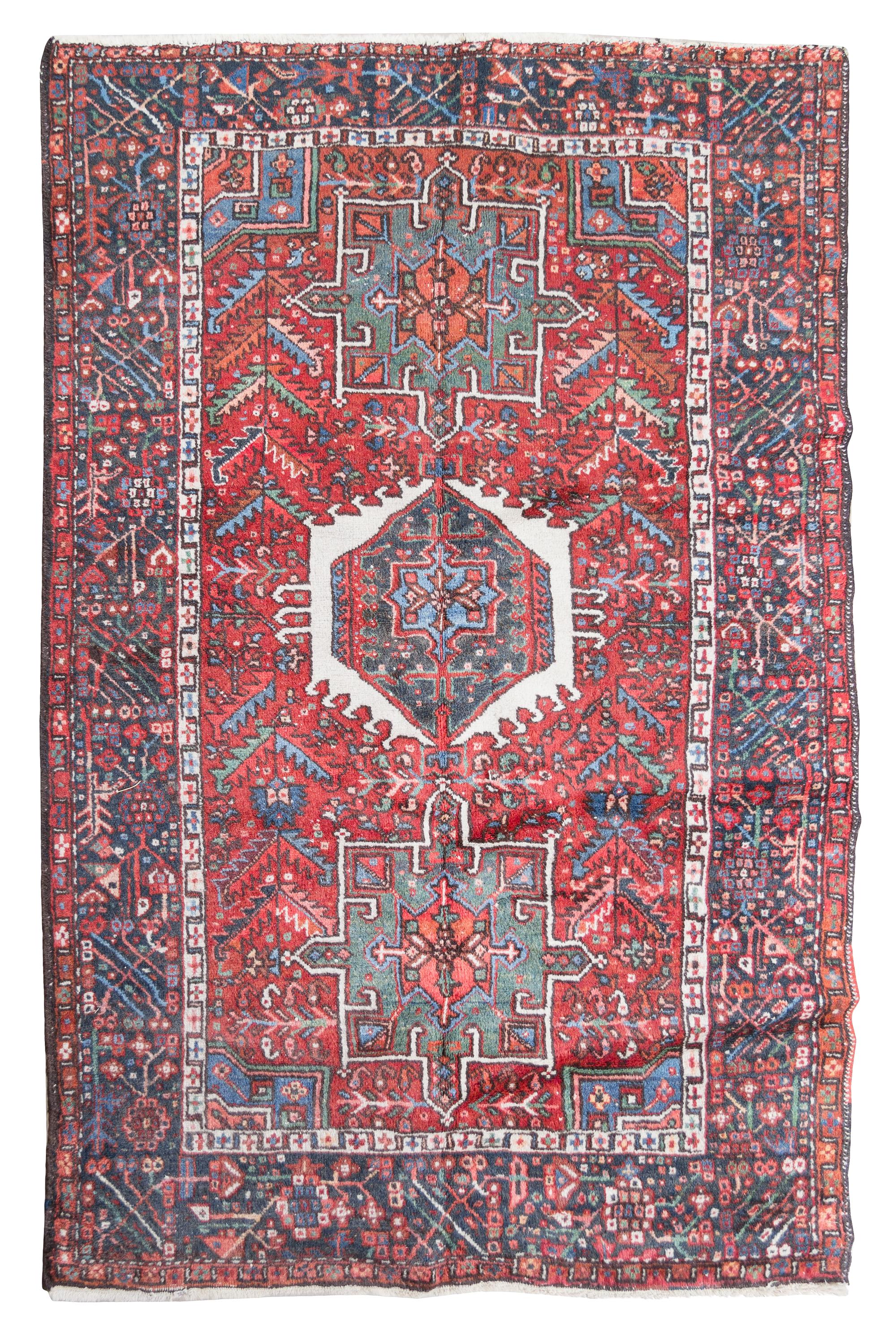 A Heriz Wool Rug 6 feet 1 inch x 4 feet 9 inches. — CIRCA 1920