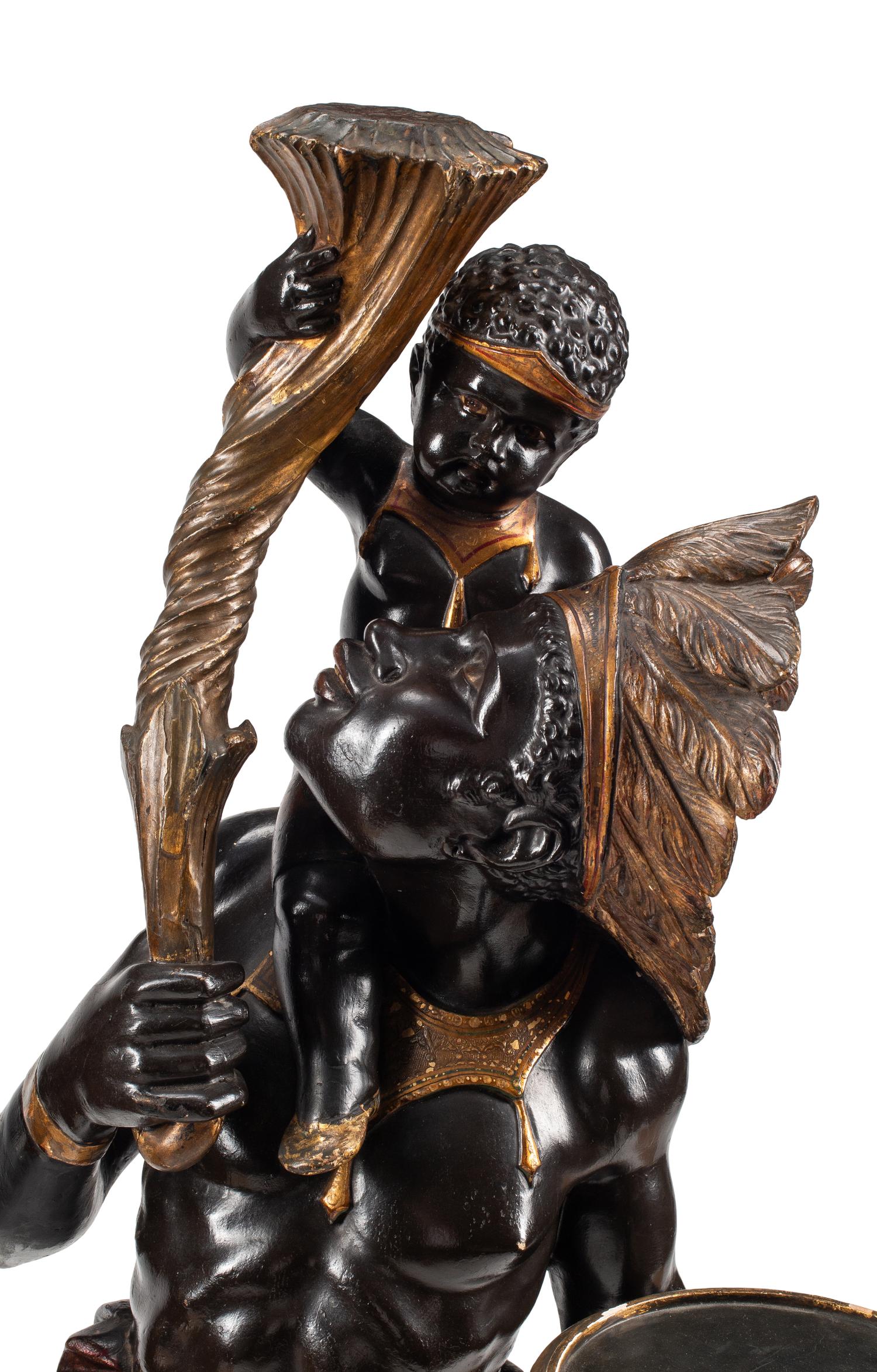 A Pair of Venetian Painted Figures
