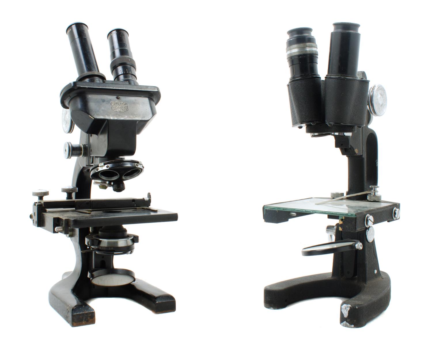 Two Black Lacquered Binocular Microscopes Height of taller 13 1/2 inches. — COOKE, TROUGHTON & SIMMS, LONDON AND SPENCER, BUFFALO, 20TH CENTURY