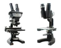 Two Black Lacquered Binocular Microscopes Height of taller 13 1/2 inches. — COOKE, TROUGHTON & SIMMS, LONDON AND SPENCER, BUFFALO, 20TH CENTURY