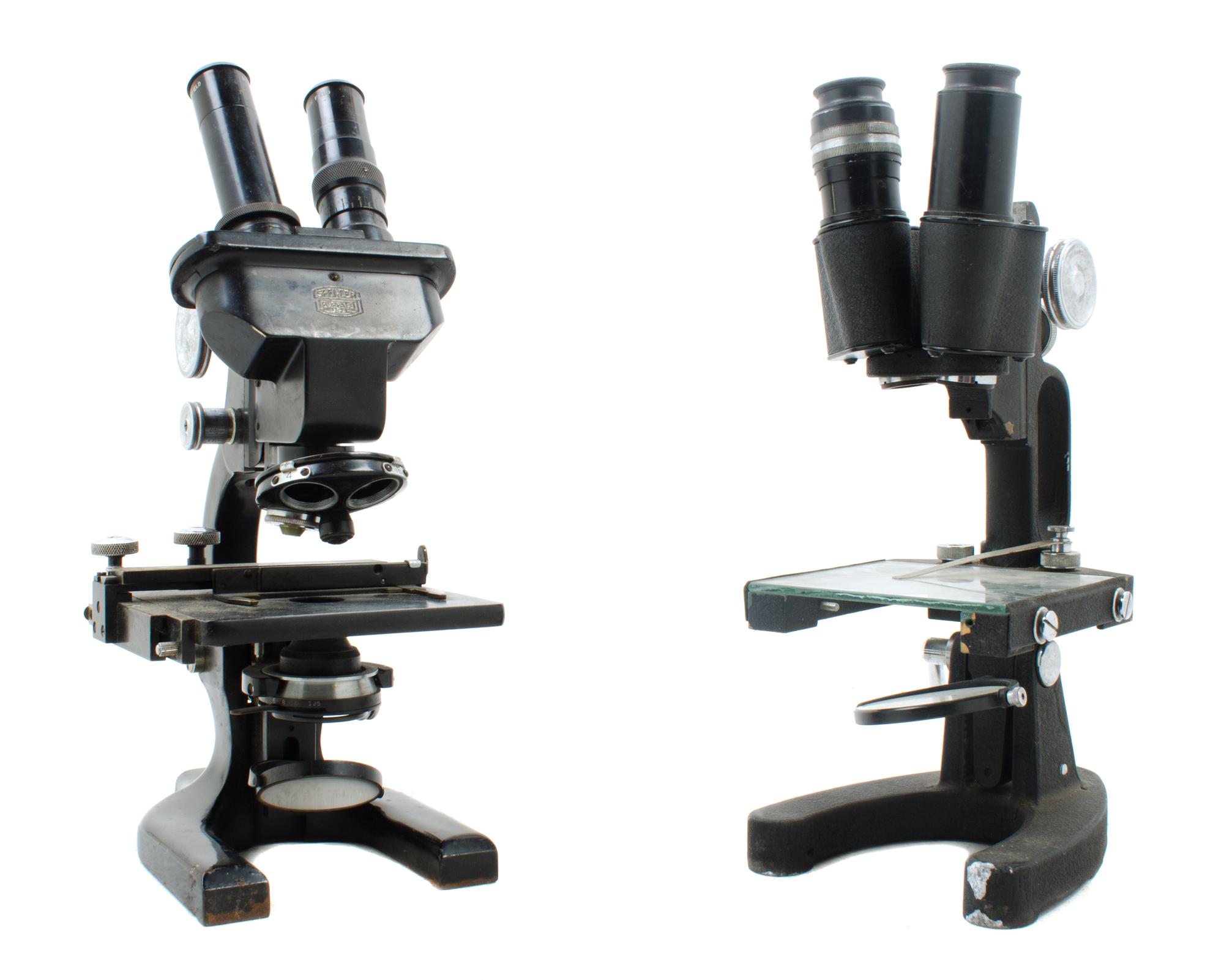 Two Black Lacquered Binocular Microscopes Height of taller 13 1/2 inches. — COOKE, TROUGHTON & SIMMS, LONDON AND SPENCER, BUFFALO, 20TH CENTURY