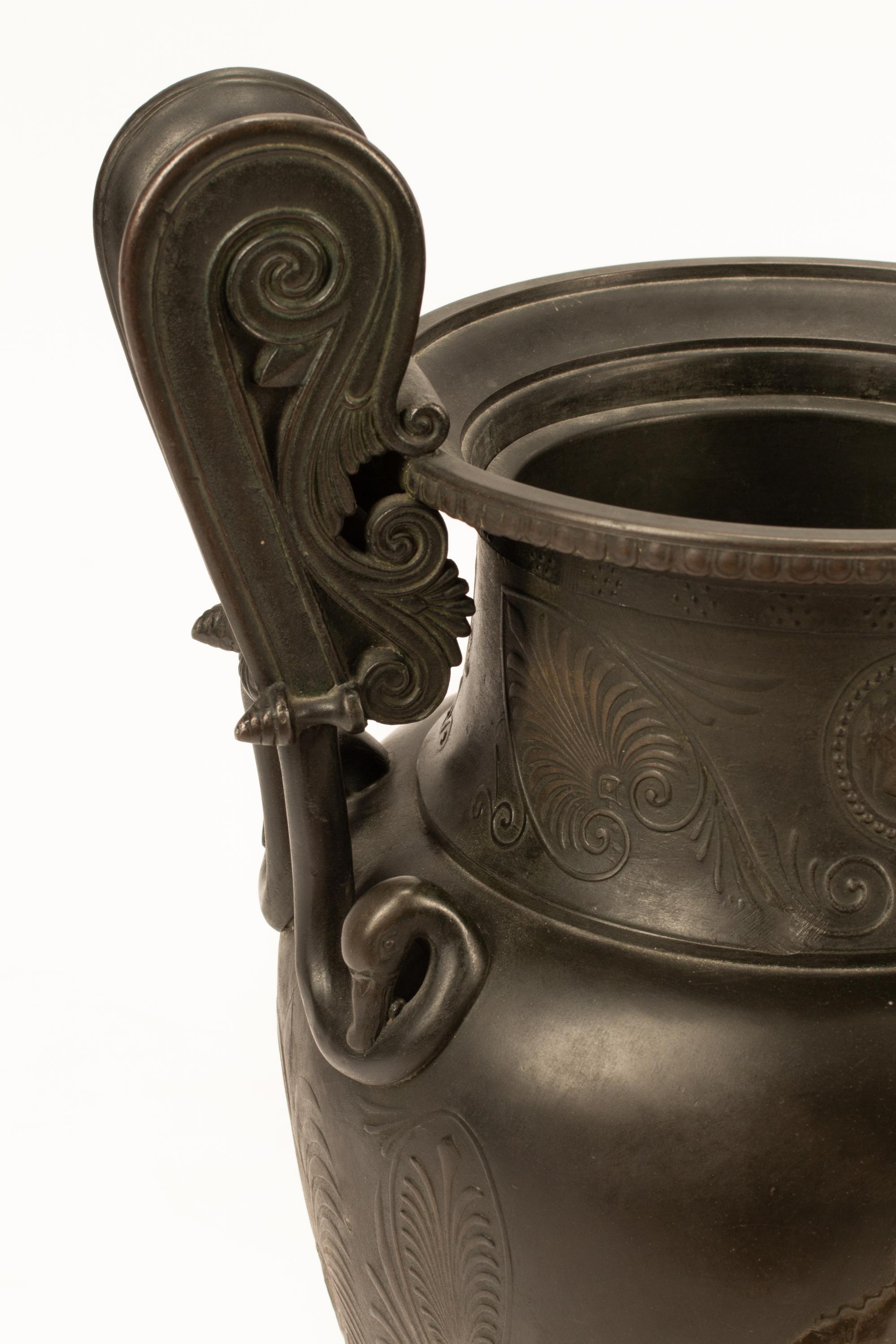 A Pair of Pompeiian Style Bronze Urns