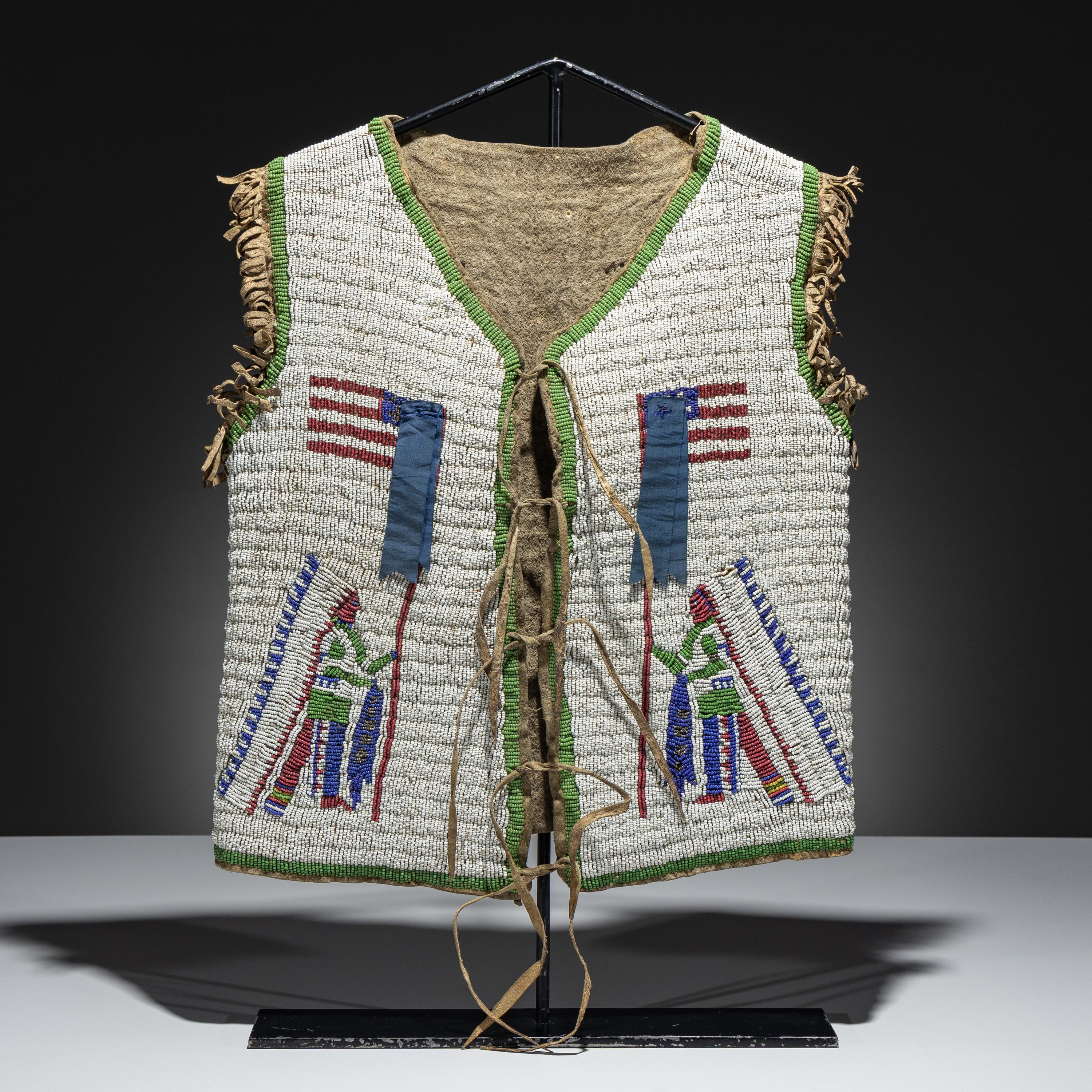 Sioux Beaded Buffalo Hide Pictorial Vest, American Flags and Warriors