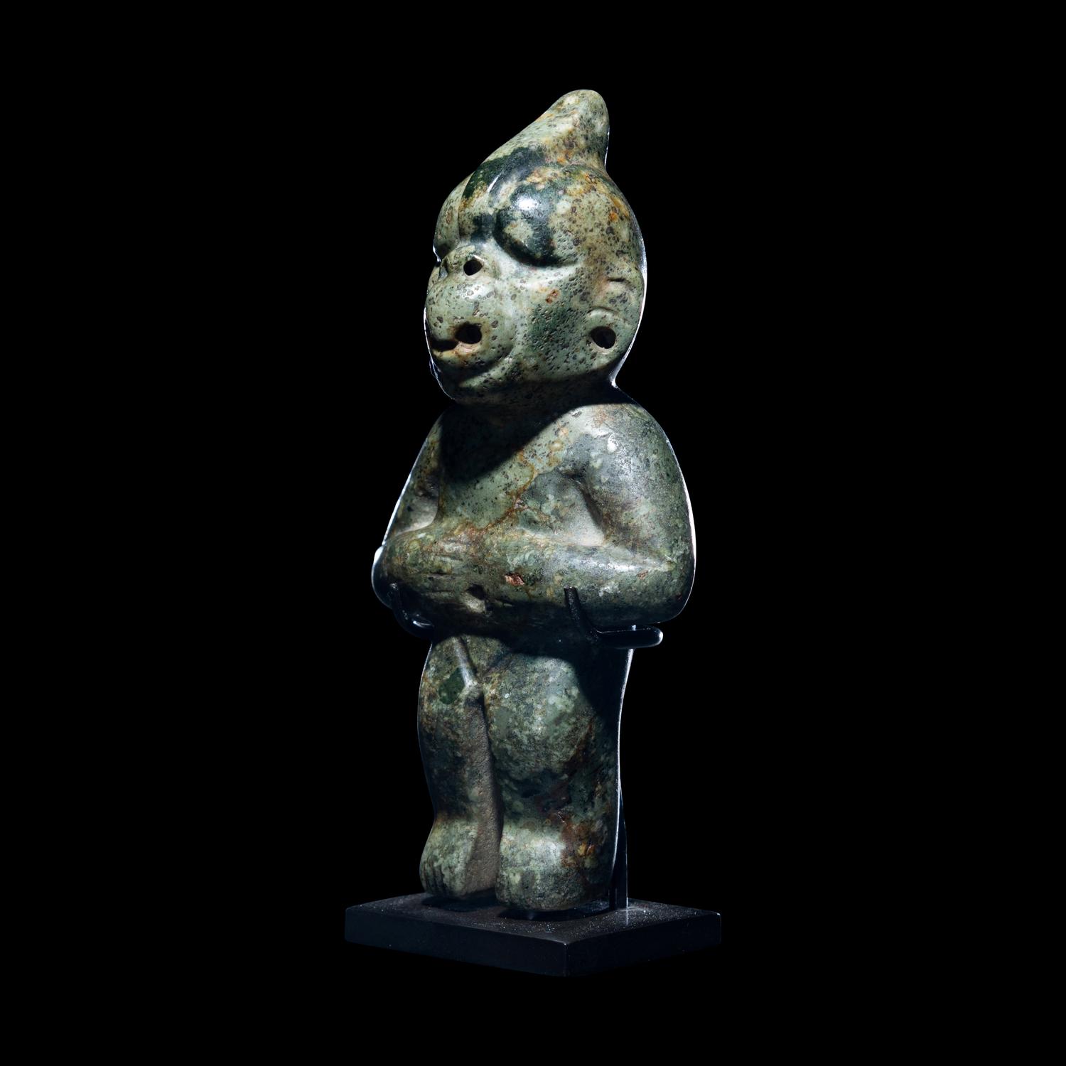 An Olmec Jade Transformation Figure