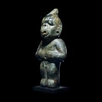 An Olmec Jade Transformation Figure