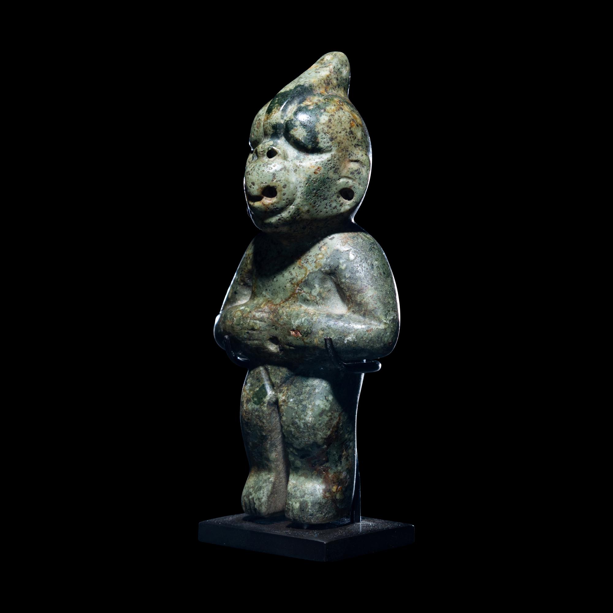 An Olmec Jade Transformation Figure