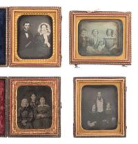[EARLY PHOTOGRAPHY]. 11 daguerreotype and ambrotype portraits of pairs and trios of sitters.