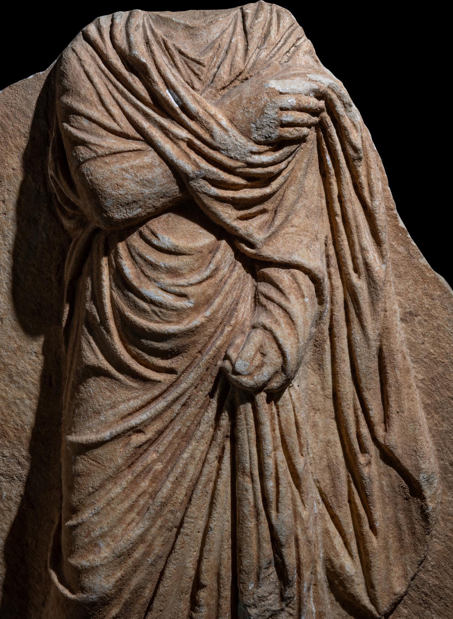 A Roman Marble Funerary Relief Fragment