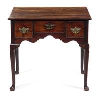 A George III Walnut Lowboy Height 27 x width 30 x depth 17 3/4 inches. — 18TH/19TH CENTURY