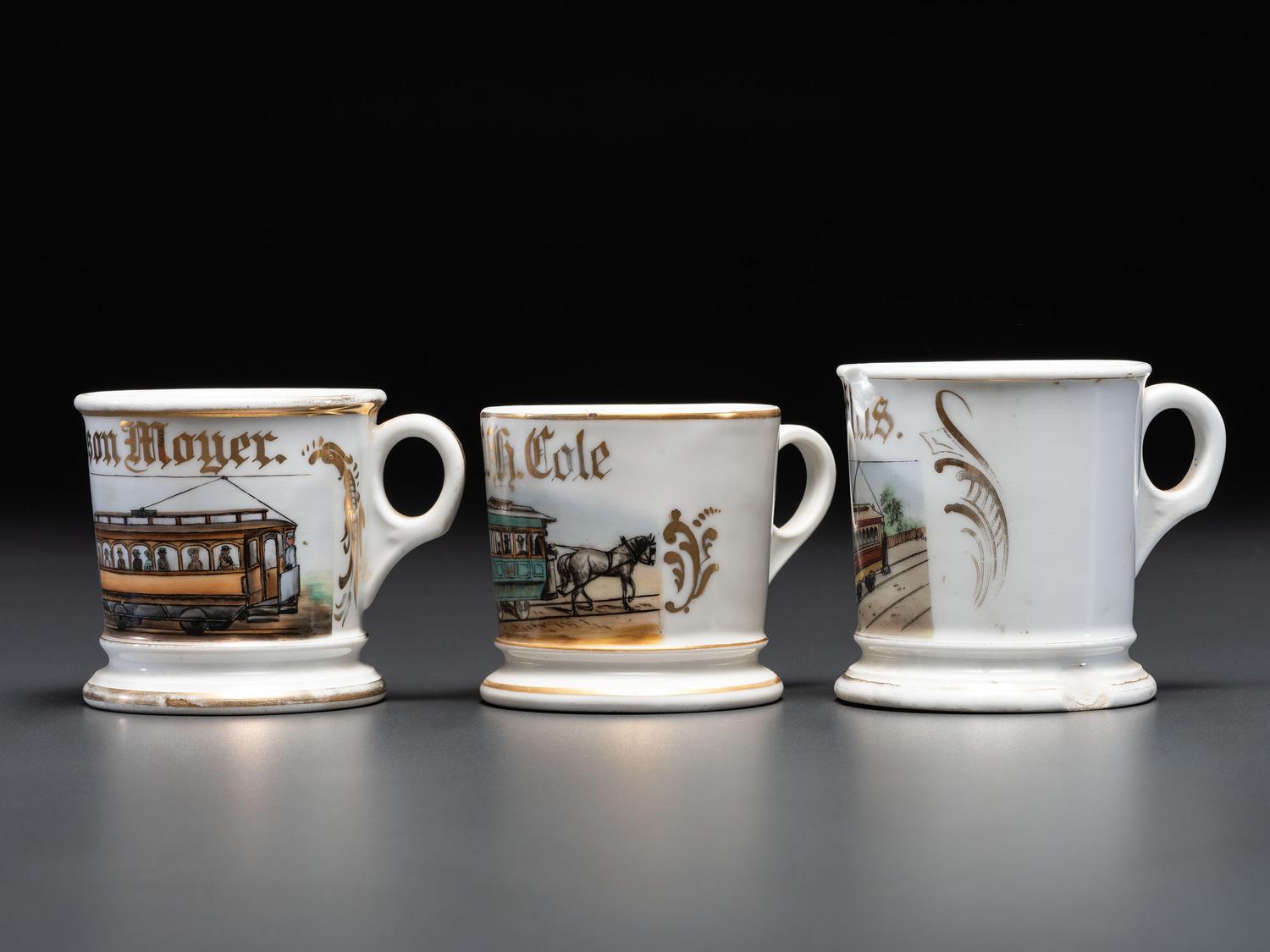 Three Trolley Operator's Porcelain Occupational Shaving Mugs
