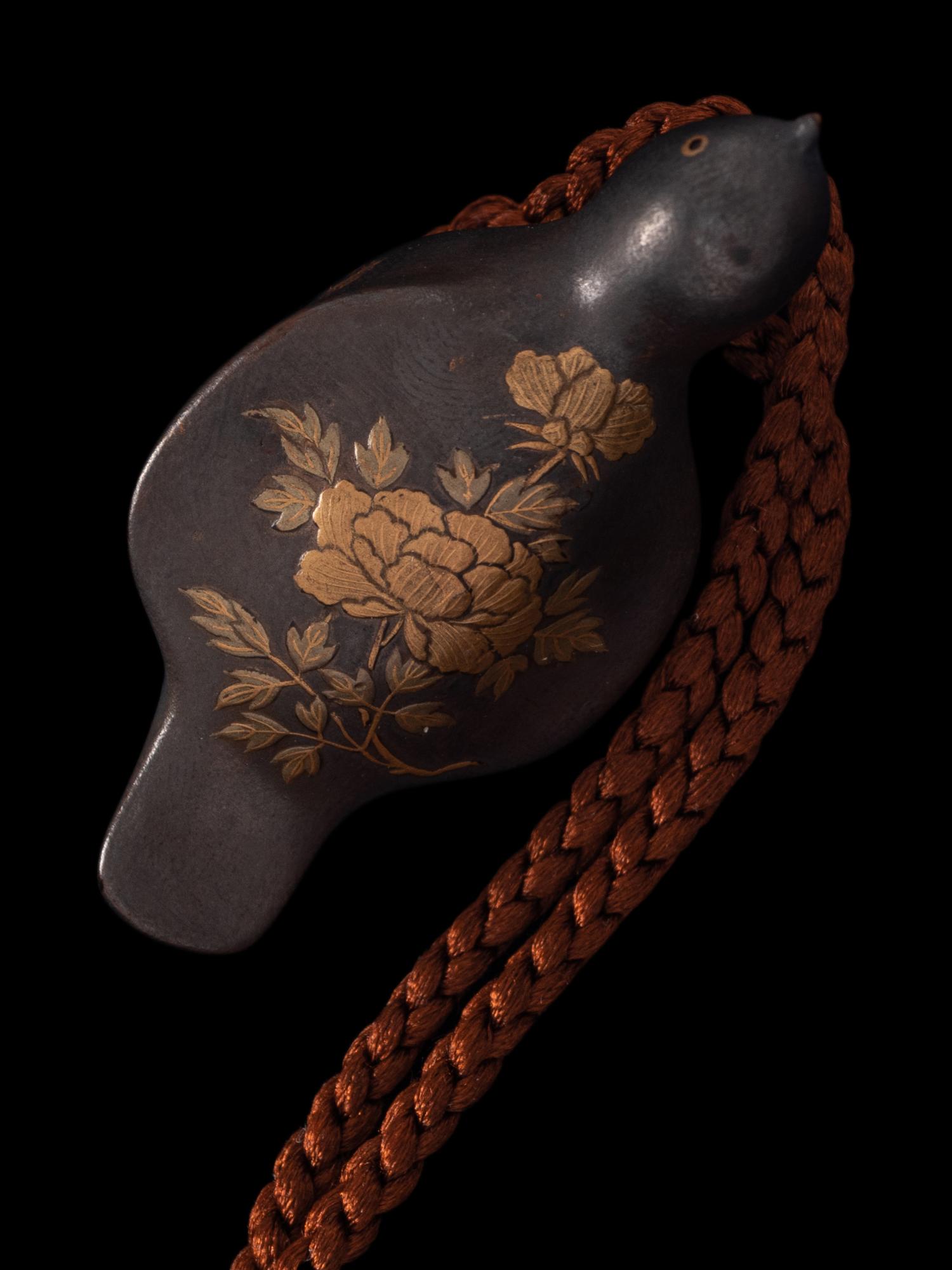 A Japanese Black and Gold Lacquer Four-Case Inro