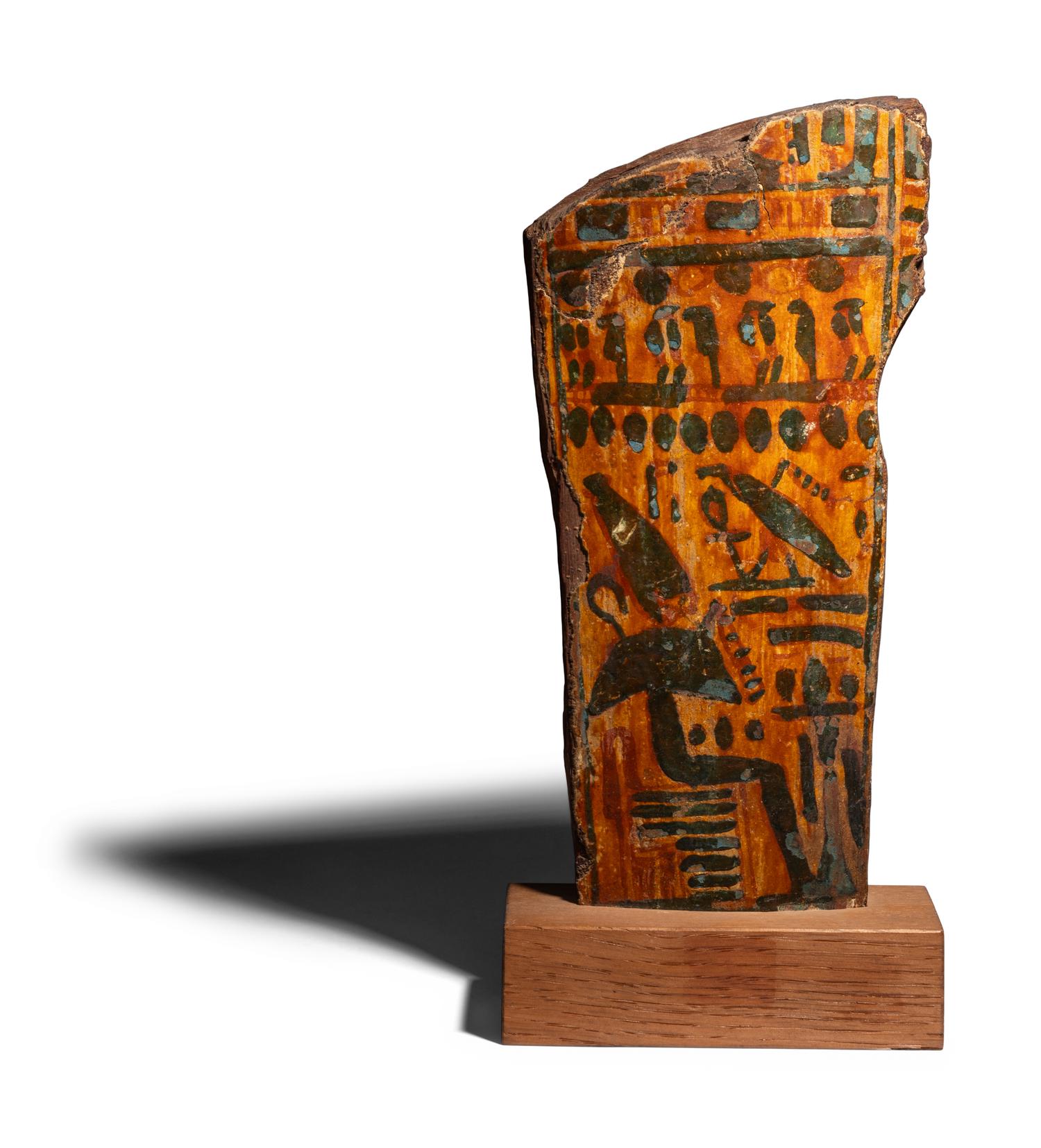 An Egyptian Painted Wood Sarcophagus Fragment