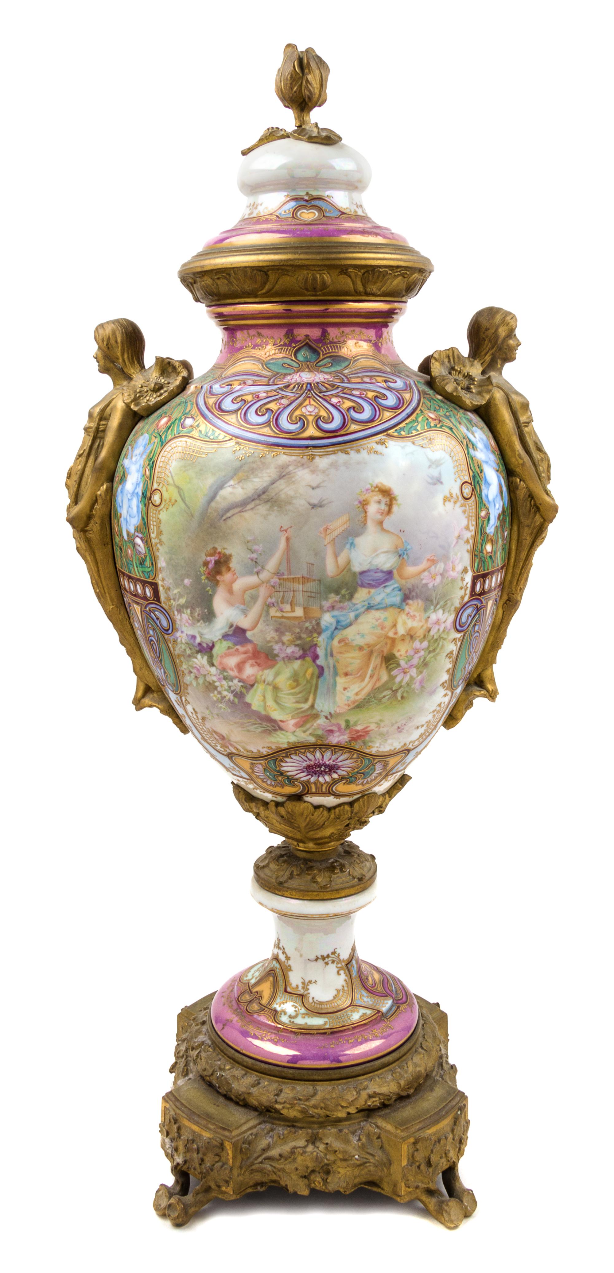A Sevres Gilt Bronze Mounted Porcelain Urn Height 31 1/2 inches.