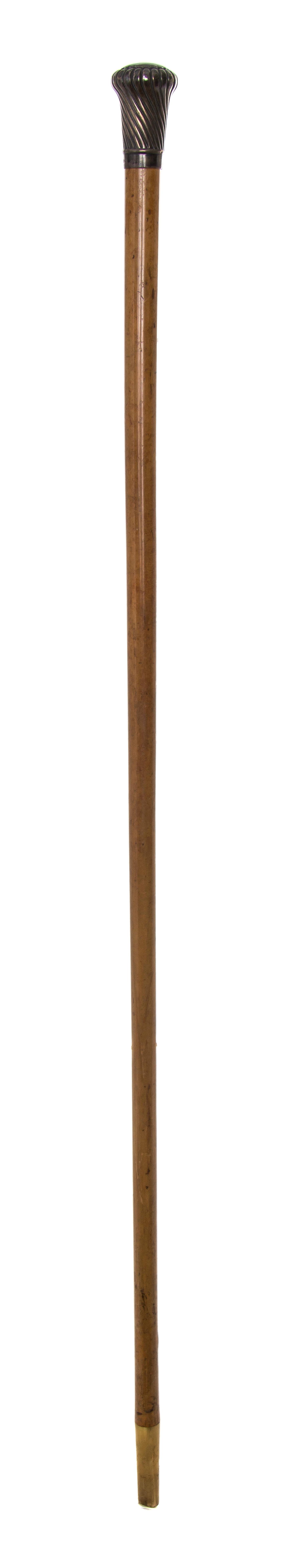 An English Silver Handled Walking Stick, Length of handle 2 1/8 x length overall 35 inches.