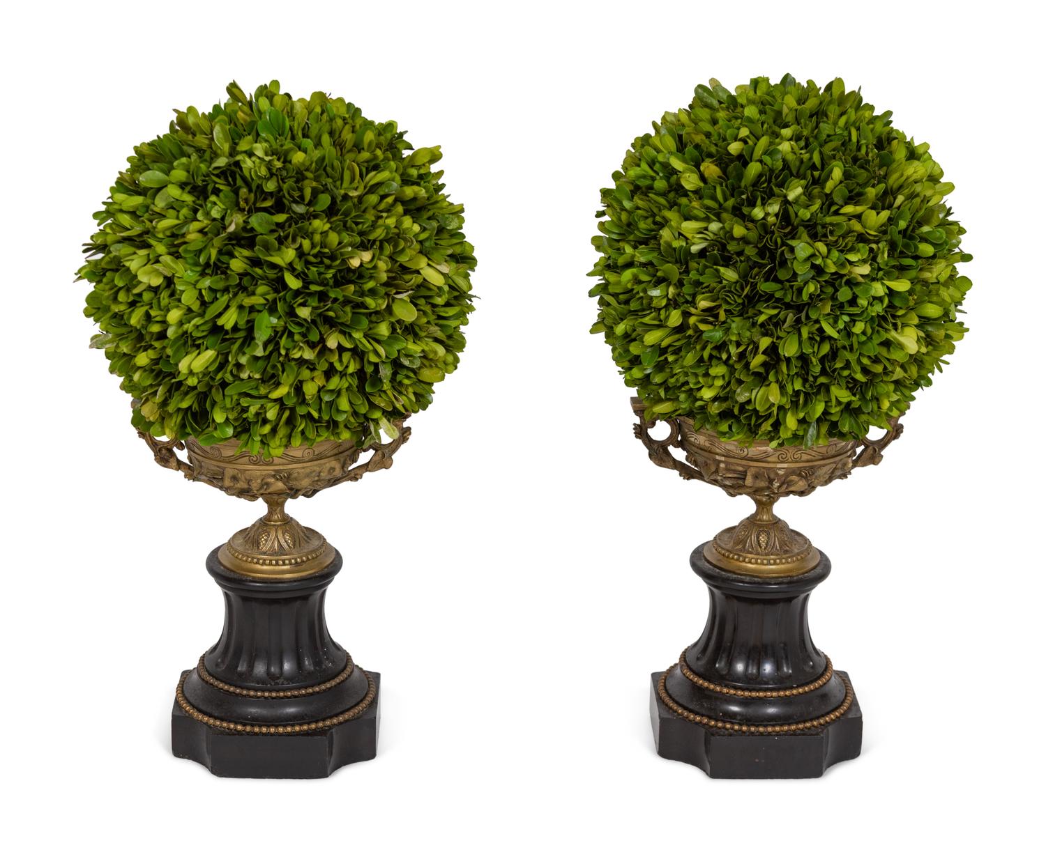 A Pair of Gilt Metal Urns with Faux Topiaries