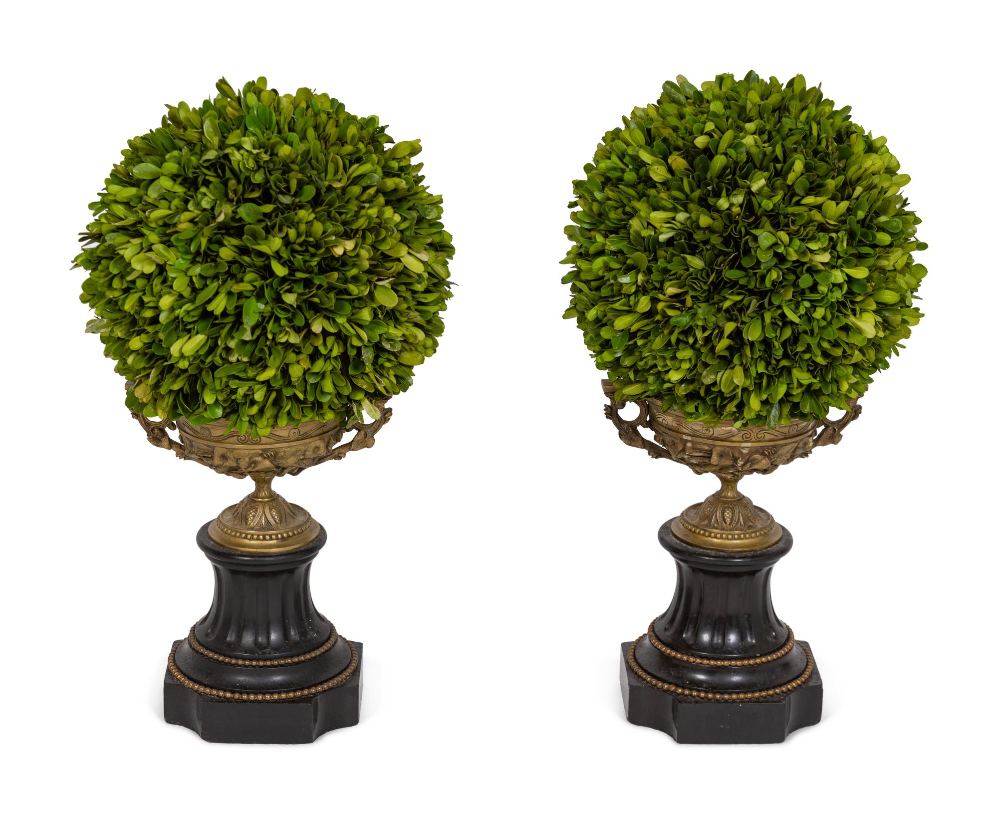 A Pair of Gilt Metal Urns with Faux Topiaries