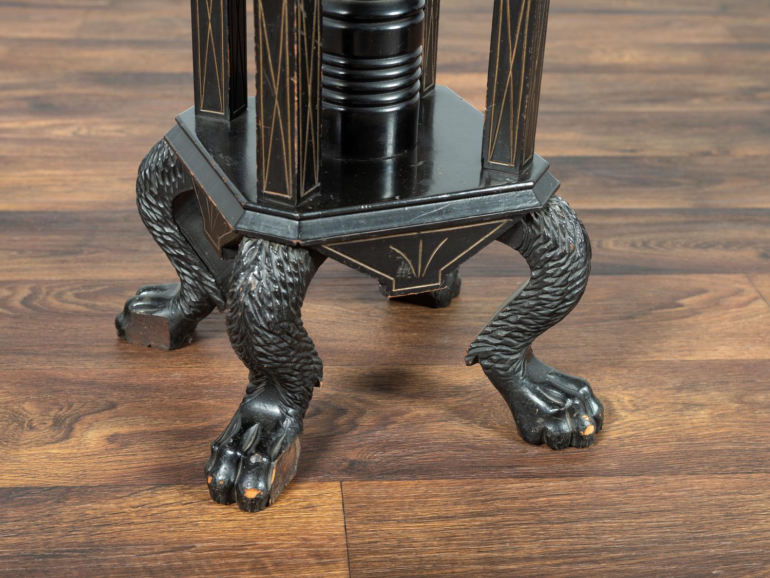 A Victorian Marble-Top Carved and Ebonized Parlor Table with Dog