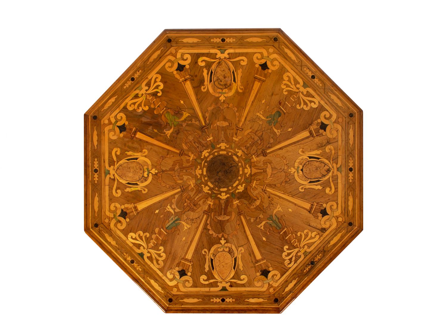 An Italian Marquetry Inlaid and Ebonized Octagonal Center Table — 19TH CENTURY