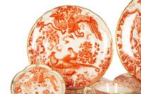 A Royal Crown Derby Red Aves Porcelain Dinner Service