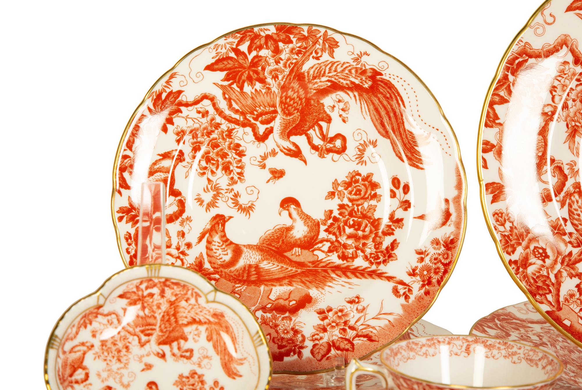 A Royal Crown Derby Red Aves Porcelain Dinner Service