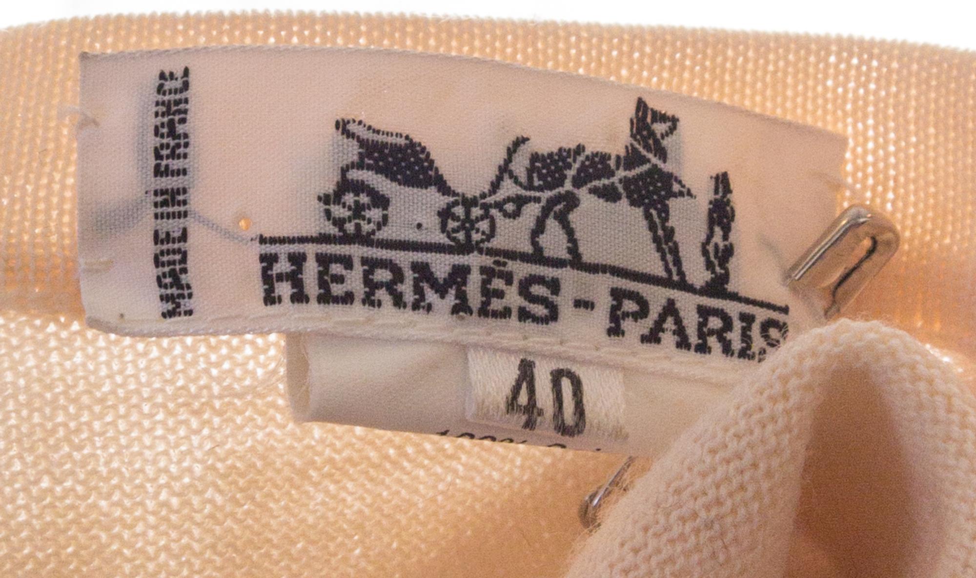 An Hermes Cream Silk Cardigan, Size 40.