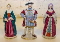 Three Capodimonte Porcelain Figures. Height 8 1/4 inches.