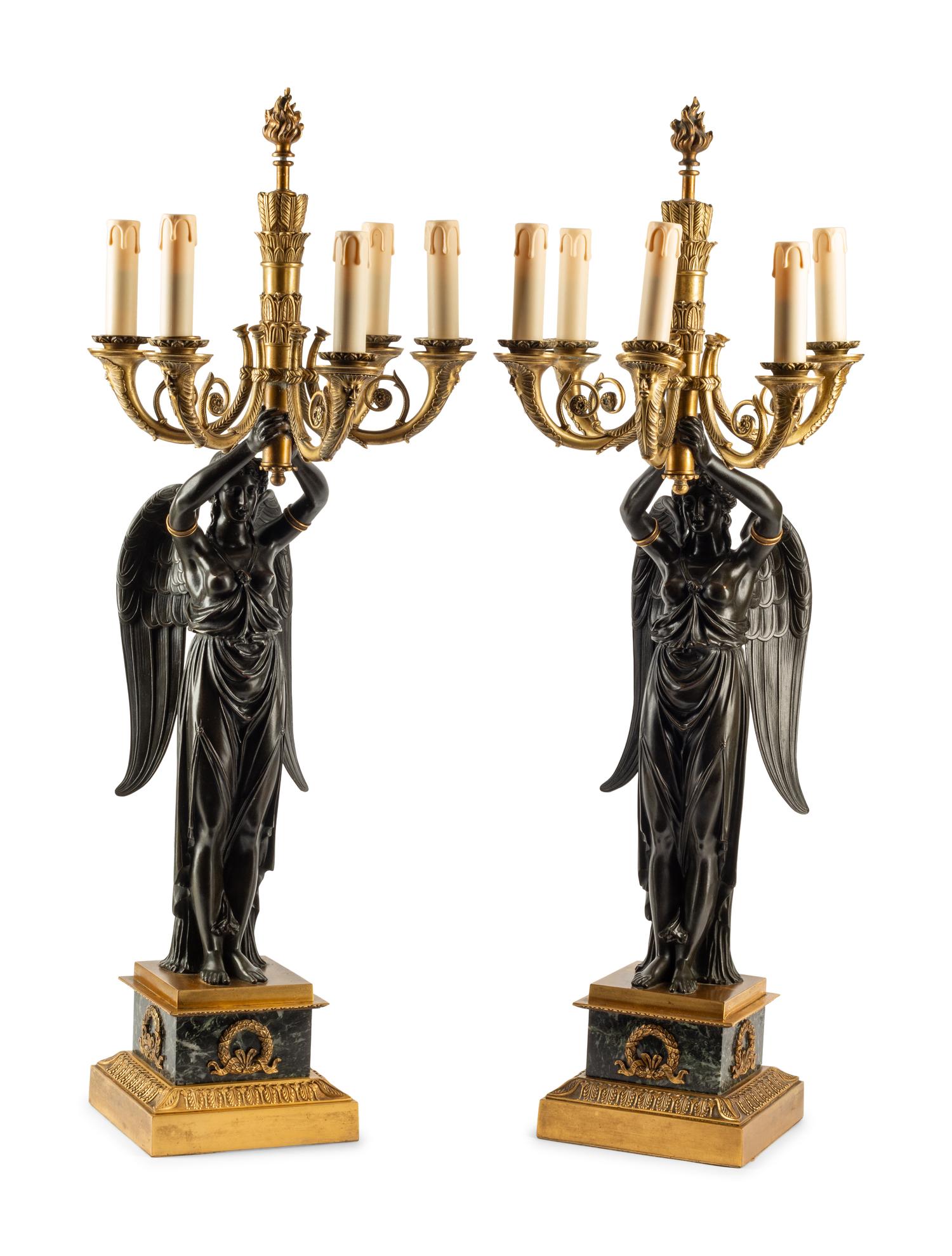 A Pair of Empire Style Gilt and Patinated Bronze and Marble Figural Candelabra
