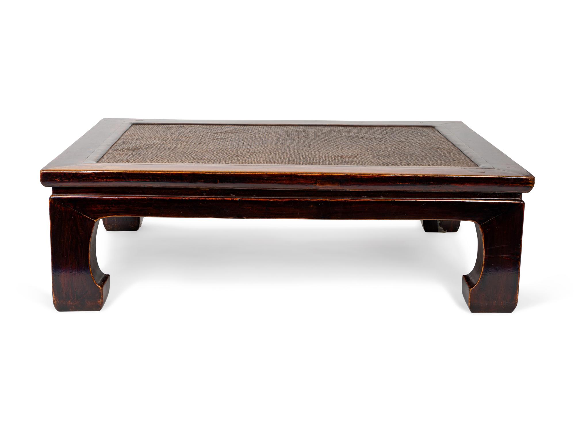 An Asian Style Rattan Inset Coffee Table — 20TH CENTURY