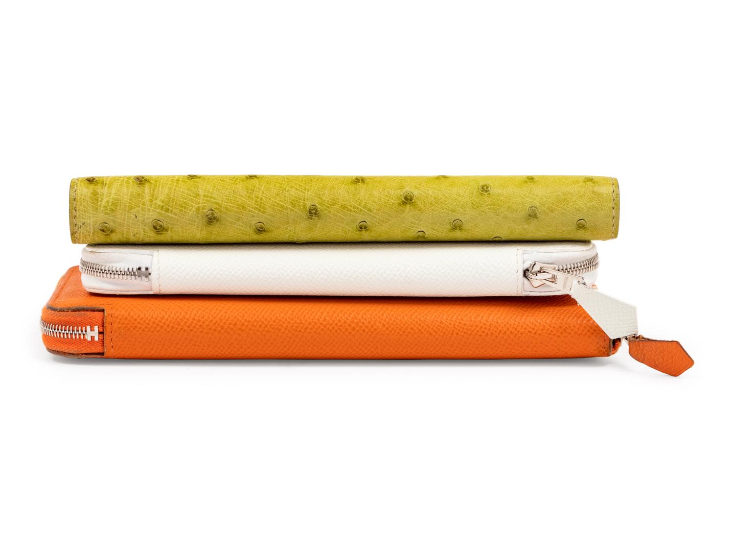 Three Hermès Items: One Ostrich Folio and Two Leather Zip Wallets, 2000-2008