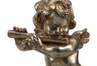 A Pair of Silvered Wood Musical Putto Ornaments