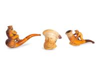 Three Carved Meerschaum Figural Pipes