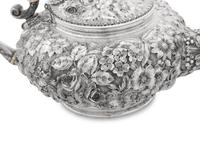 An American Silver Repoussé Four-Piece Tea Service