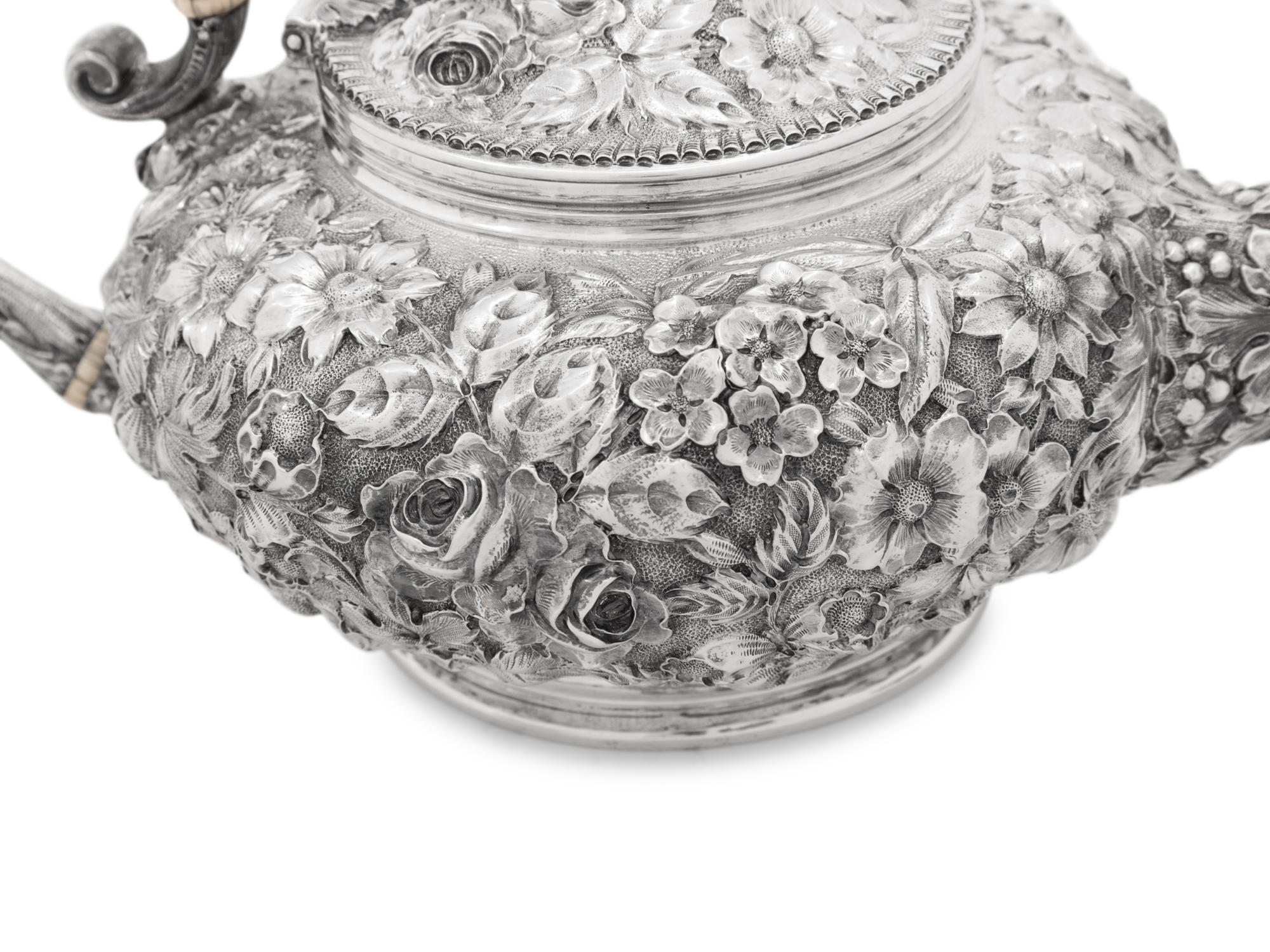 An American Silver Repoussé Four-Piece Tea Service
