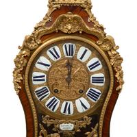 A Louis XV Gilt Bronze Mounted Kingwood Bracket Clock with Matching Wall Bracket