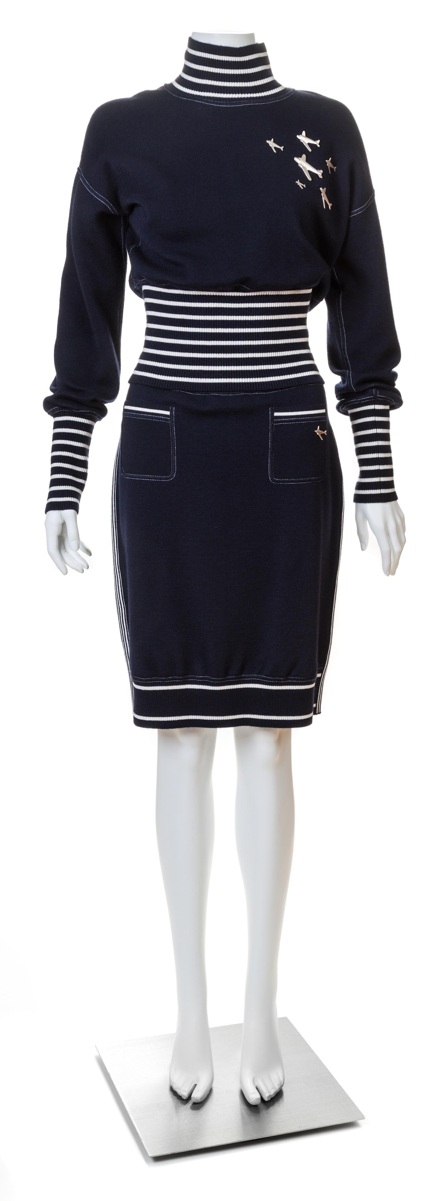 A Chanel Navy Three Piece Jacket and Skirt Ensemble, Jacket and skirt size 42, Top size 40.