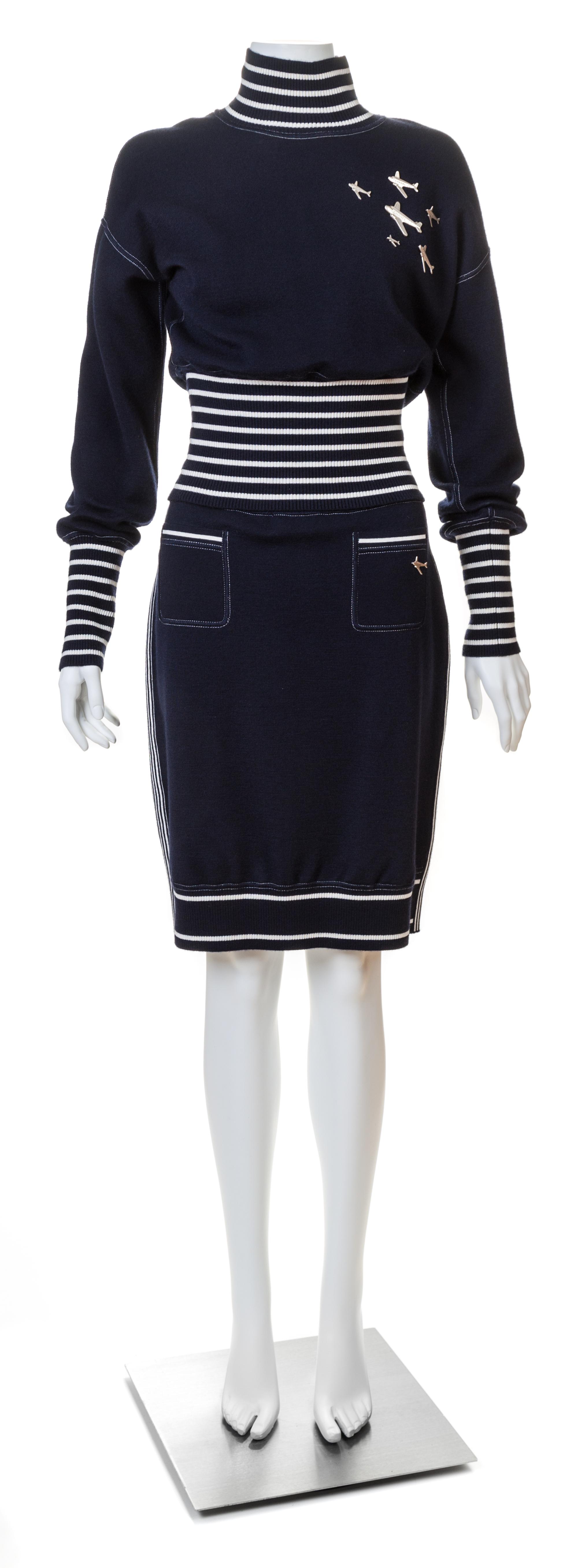 A Chanel Navy Three Piece Jacket and Skirt Ensemble, Jacket and skirt size 42, Top size 40.