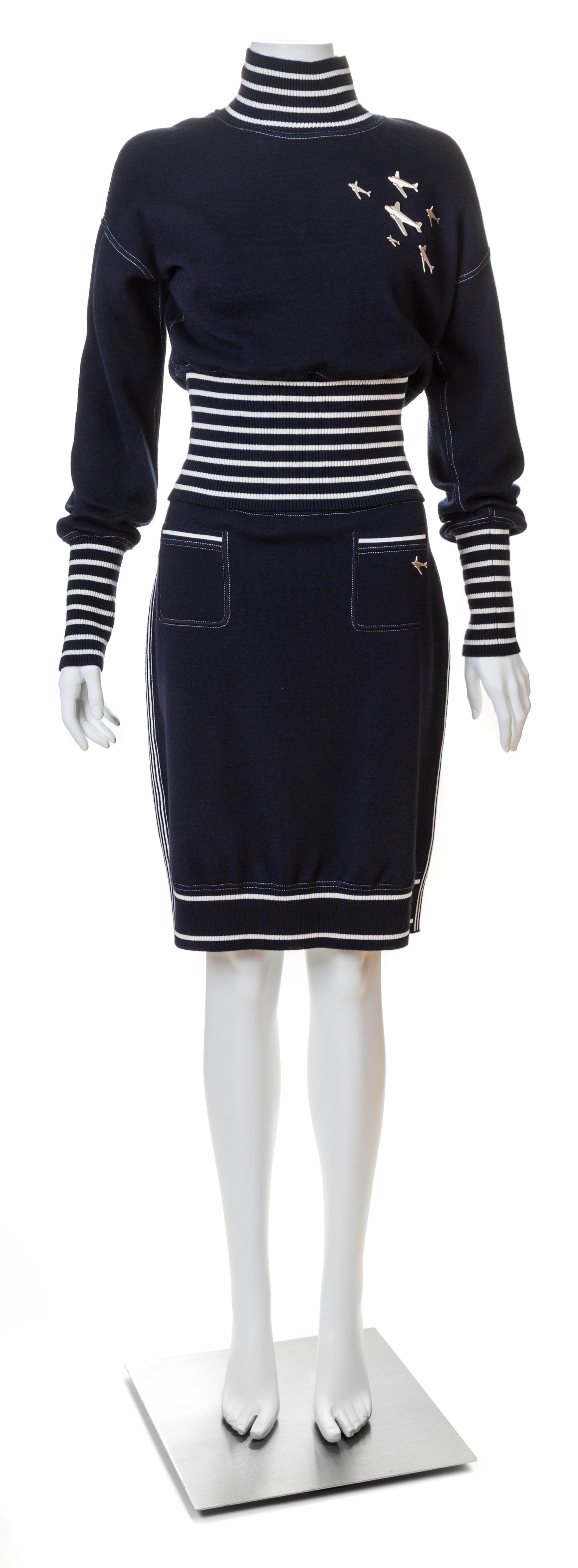 A Chanel Navy Three Piece Jacket and Skirt Ensemble, Jacket and skirt size 42, Top size 40.