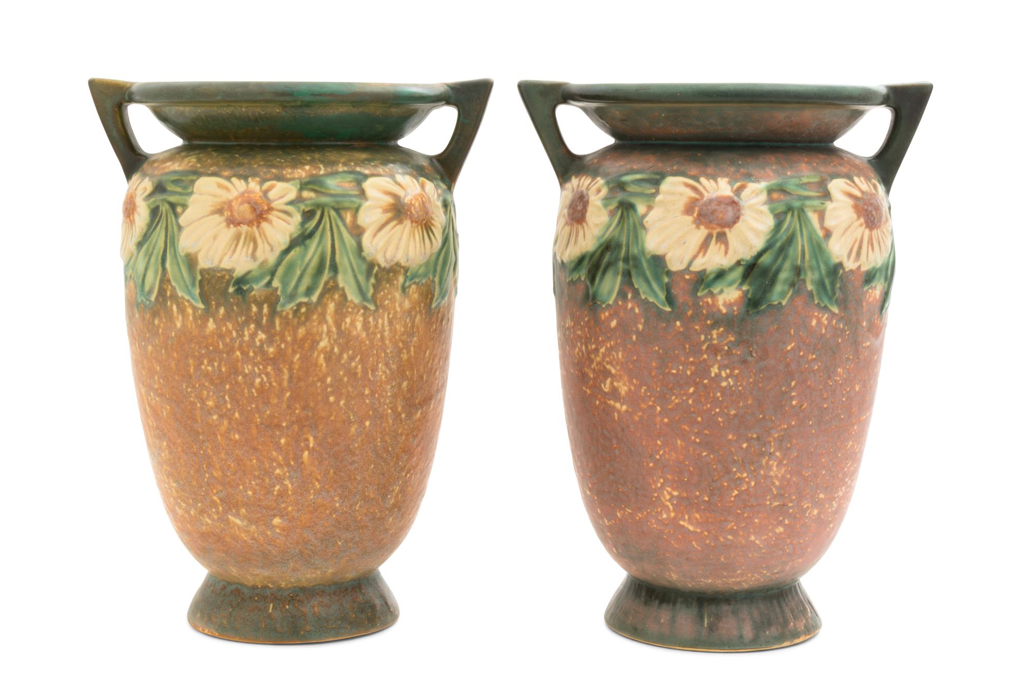 A Pair of Roseville Dahlrose Pottery Vases Height 12 1/4 inches.