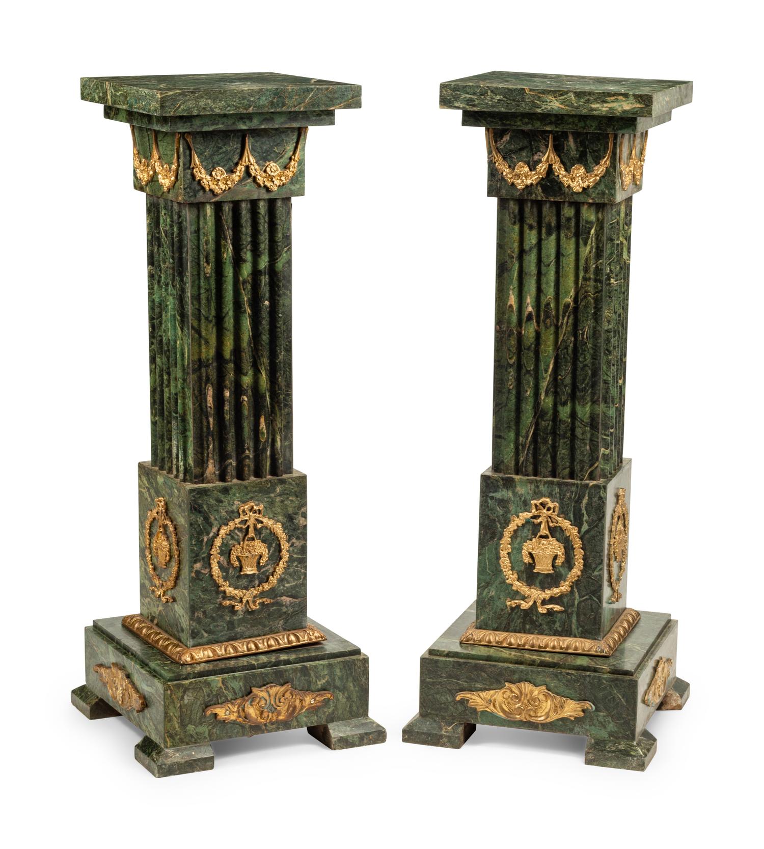 A Pair of Continental Gilt Bronze Mounted Marble Pedestals