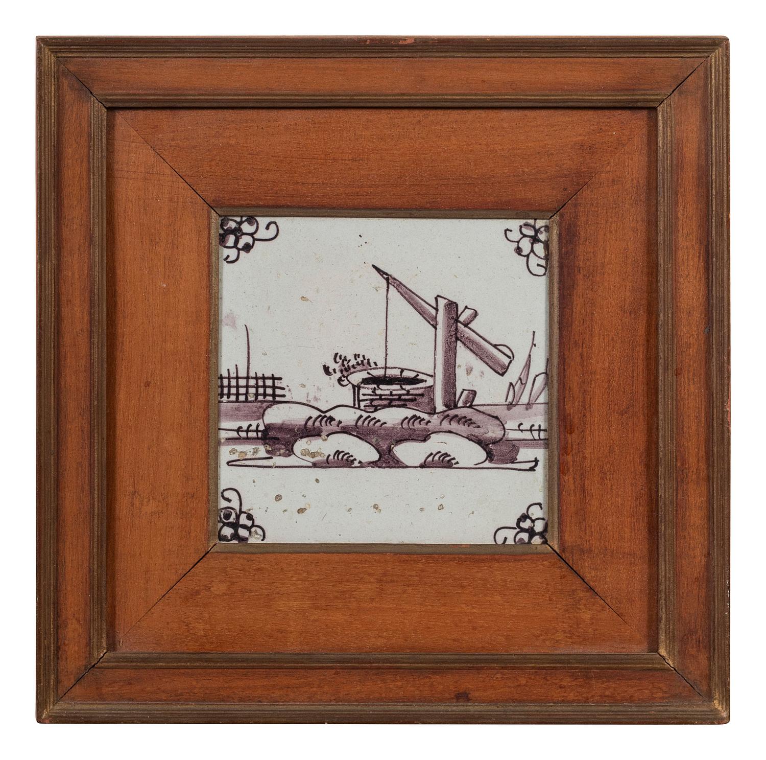 A Set of Five Framed Puce Delft Tiles