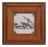 A Set of Five Framed Puce Delft Tiles