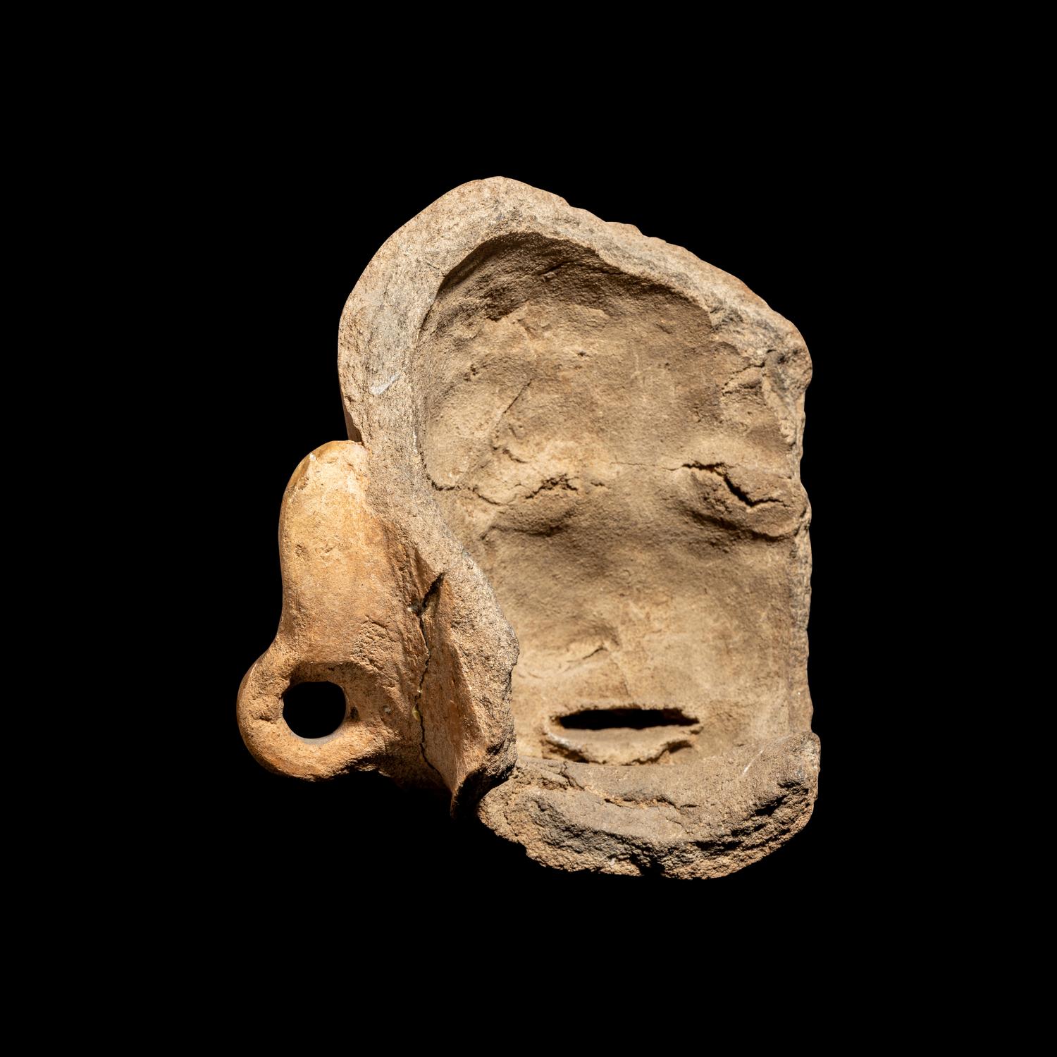 A Veracruz Terracotta Fragment of a Male Head