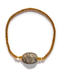 An Egyptian Steatite Scarab — Set in a gold bracelet